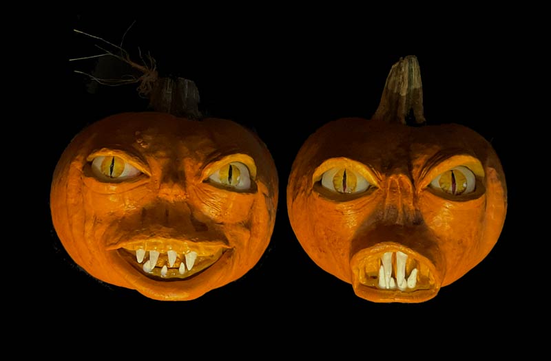 Two pumpkins with added faces.